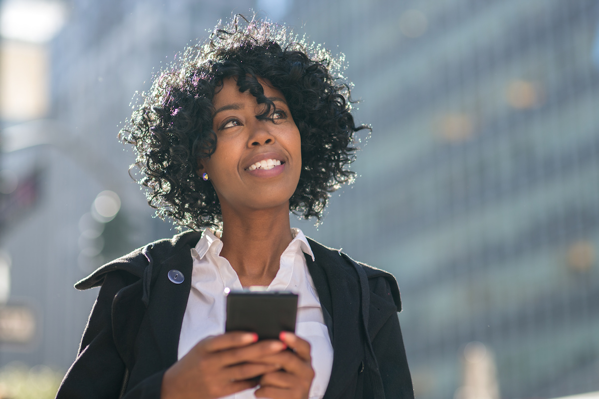 African American Millennial with Phone